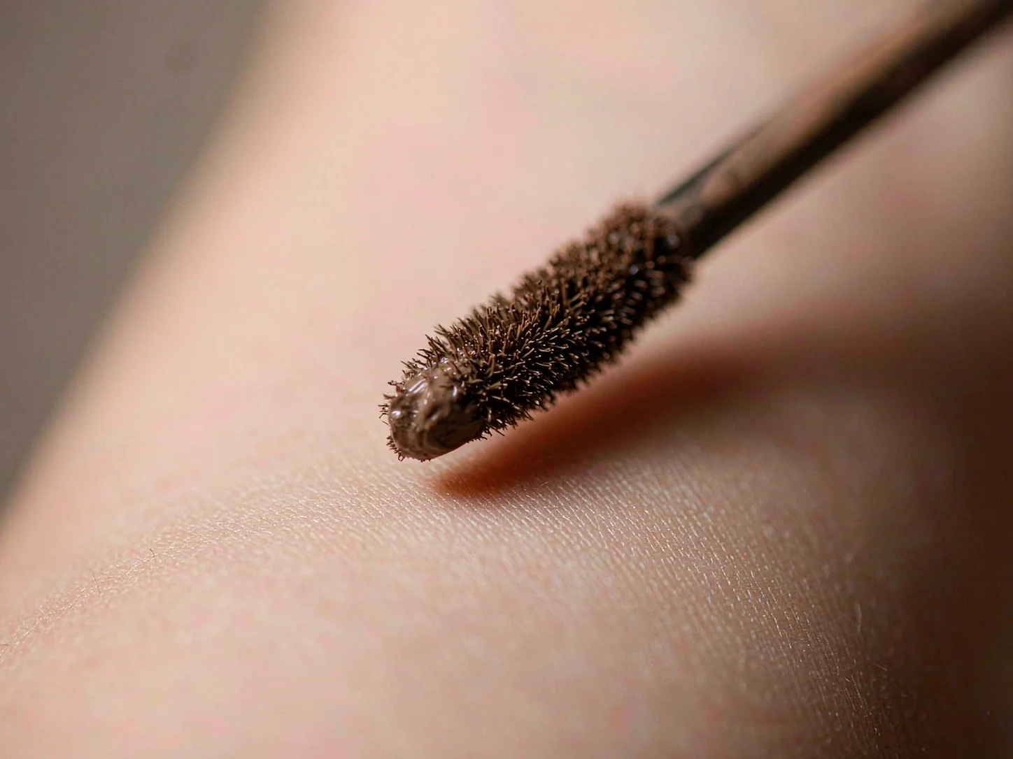 Concealer applicator head with small flocked tip