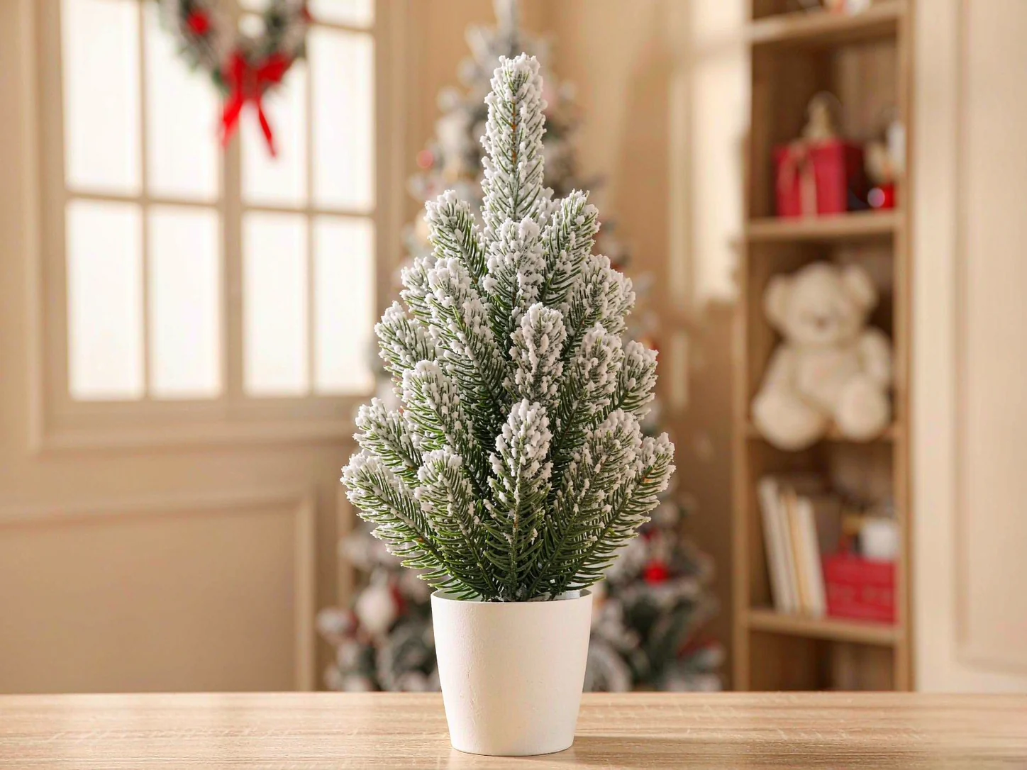 Tabletop Christmas tree with light snow flock